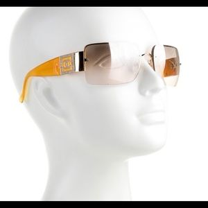 Chanel woman’s aviator and rhinestone sunglasses